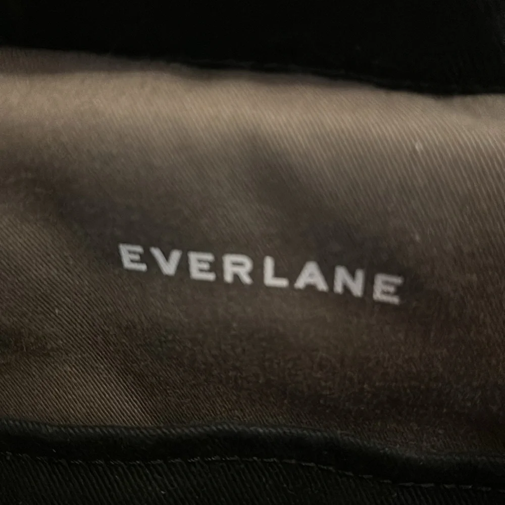 Everlane Modern Snap black cinch closure padded interior cotton blend backpack